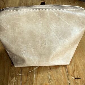 𝅺anthropologie tan faux leather cosmetic case make up bag clutch carryall